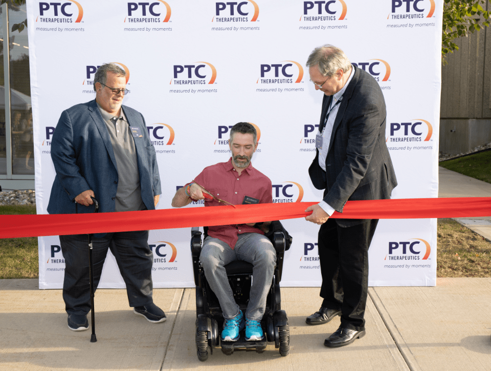 Kyle Bryant cutting the ribbon at PTC's Gene Therapy Center of Excellence