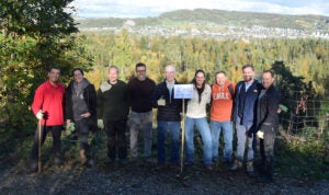 PTC colleagues standing on a hill in Switzerland